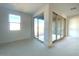 Dining area with sliding glass doors leading to a patio at 9530 W Luxton Ln, Tolleson, AZ 85353