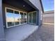 Covered patio with sliding glass doors at 9530 W Luxton Ln, Tolleson, AZ 85353