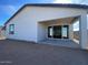 Home exterior showcasing a covered patio at 9534 W Luxton Ln, Tolleson, AZ 85353