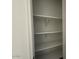 Organized pantry space with multiple shelves for ample storage at 9534 W Luxton Ln, Tolleson, AZ 85353