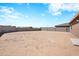 Large backyard with block wall and desert landscape at 961 W 20 Th St, Florence, AZ 85132