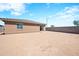 Large, unlandscaped backyard with block wall at 961 W 20 Th St, Florence, AZ 85132