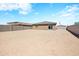 Large backyard with block wall and desert landscaping at 961 W 20 Th St, Florence, AZ 85132