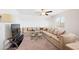 Comfortable living room featuring a sectional sofa and a ceiling fan at 961 W 20 Th St, Florence, AZ 85132