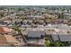 Aerial showing house, neighborhood and golf course at 9832 W Oraibi Dr, Peoria, AZ 85382