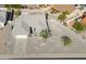 Single story home with desert landscaping and two palm trees at 9832 W Oraibi Dr, Peoria, AZ 85382