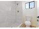 Updated bathroom with walk-in shower and modern fixtures at 9832 W Oraibi Dr, Peoria, AZ 85382