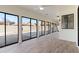 Sunroom with tile floor and multiple sliding glass doors at 9832 W Oraibi Dr, Peoria, AZ 85382