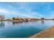 Scenic waterfront homes along a tranquil lake, offering a serene neighborhood setting and views at 10971 W Tonopah Dr, Peoria, AZ 85373