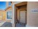 Inviting house exterior with a light-colored front door and house number 11355 at 11355 E Verbina Ln, Florence, AZ 85132