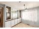 Dining area with built-in hutch and window at 11411 N 91 Ave # 56, Peoria, AZ 85345