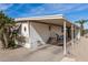 Carport and side view of manufactured home at 11411 N 91 Ave # 56, Peoria, AZ 85345