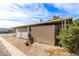 Manufactured home with storage shed and carport at 11411 N 91 Ave # 56, Peoria, AZ 85345