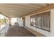Covered porch with railing and windows at 11411 N 91 Ave # 56, Peoria, AZ 85345