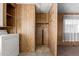 Laundry room with washer, dryer, and storage shelves at 11411 N 91 Ave # 56, Peoria, AZ 85345