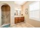 Bathroom with walk-in shower and single vanity at 13050 W Pinnacle Vista Dr, Peoria, AZ 85383