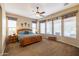 Bright bedroom with wooden furniture and large windows at 13050 W Pinnacle Vista Dr, Peoria, AZ 85383