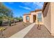 Landscaped pathway leading to the front entrance of a home at 13050 W Pinnacle Vista Dr, Peoria, AZ 85383