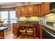 Well-equipped kitchen with ample wood cabinets and drawers at 13050 W Pinnacle Vista Dr, Peoria, AZ 85383