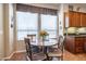 Kitchen nook with a round table and chairs near window at 13050 W Pinnacle Vista Dr, Peoria, AZ 85383