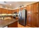 Kitchen features stainless steel appliances and a large island at 13050 W Pinnacle Vista Dr, Peoria, AZ 85383