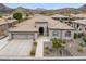 Aerial view of a desert home showcasing the tile roof and lush landscaping at 13370 E Del Timbre Dr, Scottsdale, AZ 85259