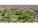 Beautiful aerial view of a well-maintained community with lush green spaces and single-Gathering homes at 14250 W Wigwam Blvd # 2822, Litchfield Park, AZ 85340