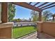Relaxing balcony overlooking the street, with a pergola for shade at 14250 W Wigwam Blvd # 2822, Litchfield Park, AZ 85340
