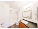 Clean bathroom featuring modern vanity, mirror, and shower/tub combo at 14250 W Wigwam Blvd # 2822, Litchfield Park, AZ 85340