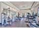 Well-equipped fitness center with modern exercise machines and mirrored walls at 14250 W Wigwam Blvd # 2822, Litchfield Park, AZ 85340
