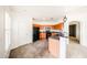 Bright kitchen showcases wood cabinetry, gray countertops, black appliances, and neutral tile flooring at 14250 W Wigwam Blvd # 2822, Litchfield Park, AZ 85340