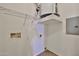 Bright laundry room with shelving, water heater, and connections for appliances at 14250 W Wigwam Blvd # 2822, Litchfield Park, AZ 85340