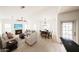 Bright living room features a fireplace, neutral color palette, and a dining area at 14250 W Wigwam Blvd # 2822, Litchfield Park, AZ 85340