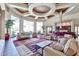 Relaxing resident lounge with comfortable seating, stylish rug, and contemporary design at 14250 W Wigwam Blvd # 2822, Litchfield Park, AZ 85340