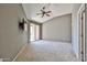 Open main bedroom with sliding glass doors leading to a private balcony at 14250 W Wigwam Blvd # 2822, Litchfield Park, AZ 85340