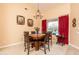 Spacious dining area with a large table and chairs, perfect for entertaining at 16019 W Kino Dr, Surprise, AZ 85374