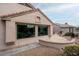 Exterior view of home showcasing large windows and curved wall at 16019 W Kino Dr, Surprise, AZ 85374