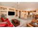 Open living space with built-in shelving and a view of the kitchen at 16019 W Kino Dr, Surprise, AZ 85374
