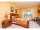 Main bedroom with a king-size bed and lots of natural light at 16019 W Kino Dr, Surprise, AZ 85374