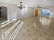 Bright dining room with tile floor and chandelier at 16187 W Port Royale Ln, Surprise, AZ 85379
