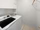 Convenient laundry room with washer and dryer included at 16187 W Port Royale Ln, Surprise, AZ 85379