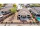 Aerial view showcasing house, pool and patio at 17906 W Agave Rd, Goodyear, AZ 85338