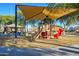 Fun playground featuring a slide, climbing structures, and a sunshade for the  at 17965 W Carol Ave, Waddell, AZ 85355