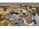 Aerial view of community amenities including a pool, playground, walking trails, and ample parking at 18716 N Jameson Dr, Maricopa, AZ 85138