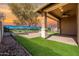 Covered back patio with brick pavers and a view of the backyard at 18716 N Jameson Dr, Maricopa, AZ 85138