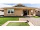 View of the backyard, patio, and lawn at 18716 N Jameson Dr, Maricopa, AZ 85138
