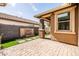 Relaxing backyard retreat with a stone water feature and landscaped patio area at 18716 N Jameson Dr, Maricopa, AZ 85138