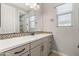 Modern bathroom vanity boasts double sinks, mosaic backsplash, and a large mirror at 18716 N Jameson Dr, Maricopa, AZ 85138