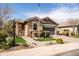 Attractive one-story home showcasing a manicured lawn, and a convenient two-car garage at 18716 N Jameson Dr, Maricopa, AZ 85138