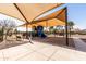 A shaded playground offers fun for with slides, swings, and climbing structures for active play at 18716 N Jameson Dr, Maricopa, AZ 85138